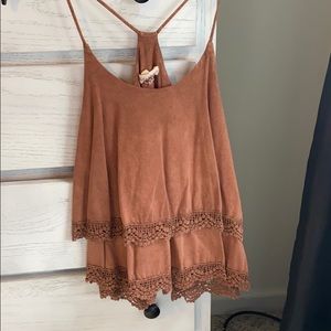 Brown, frilly tank top.